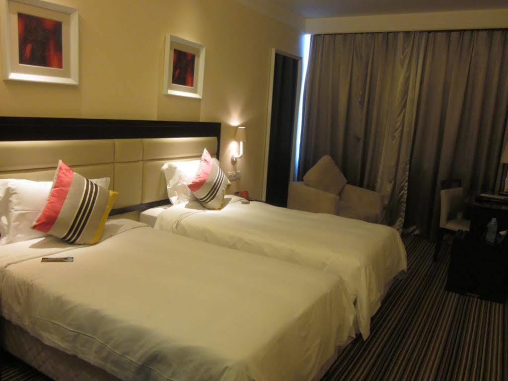 Joy Inn Gongbei Джухай Екстериор снимка